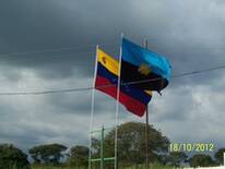 Banderas:Venezuela y del Estado Zulia.