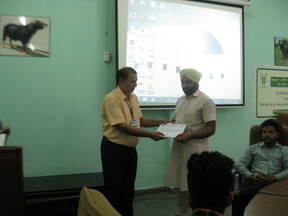 Certificates being given to trainees